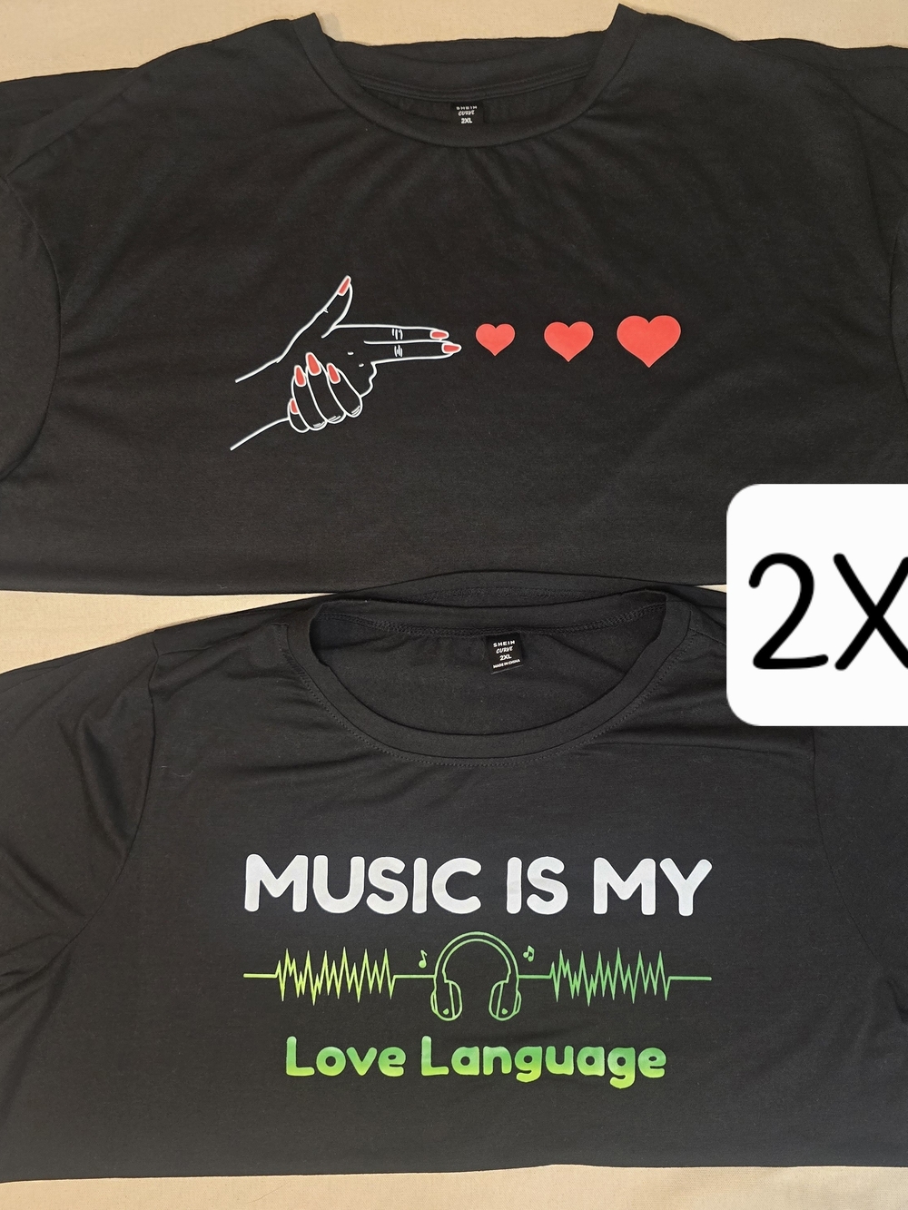 Black Graphic Tees with Red Heart and Green Music Design
